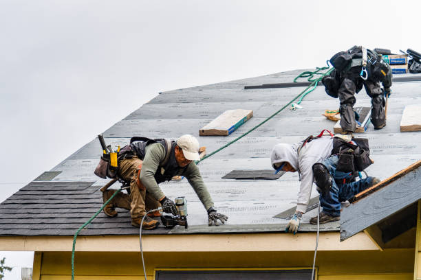 Professional Gutter Installation technician working in Lake Cicott, IN